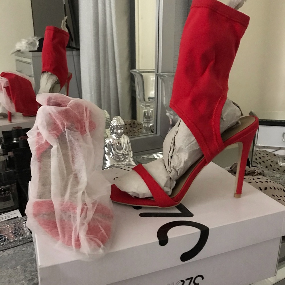 Red High Heeled Shoe
